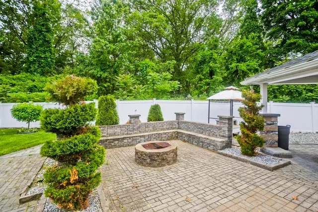 a house view with a backyard space