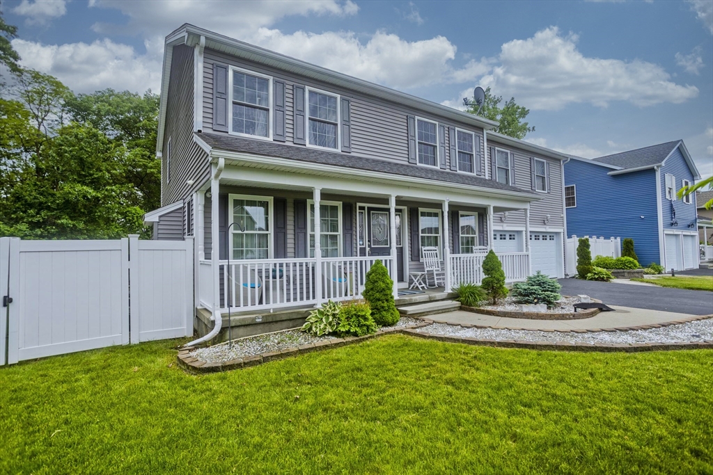 210 Naismith Street Springfield, MA 01104 - Photo 42 of 42 a house view with a garden space