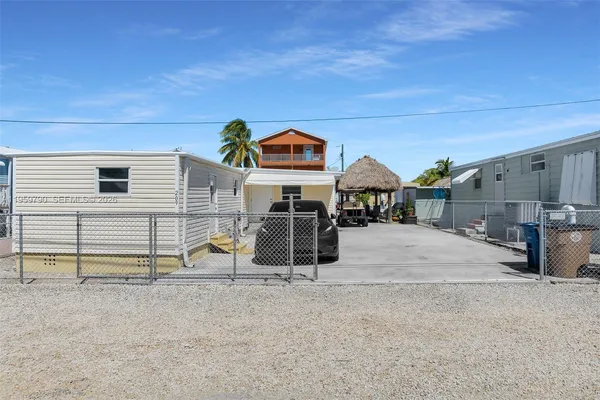 a view of house with outdoor space