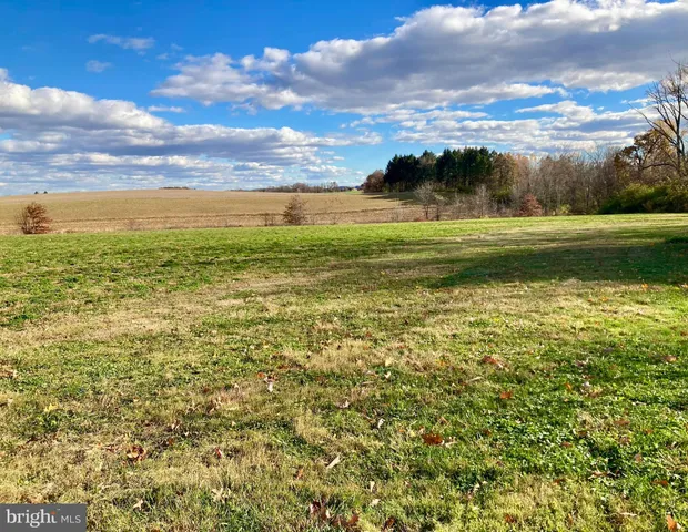 a backyard of a house with seating space