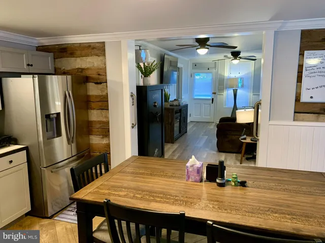 a kitchen with refrigerator and countertop