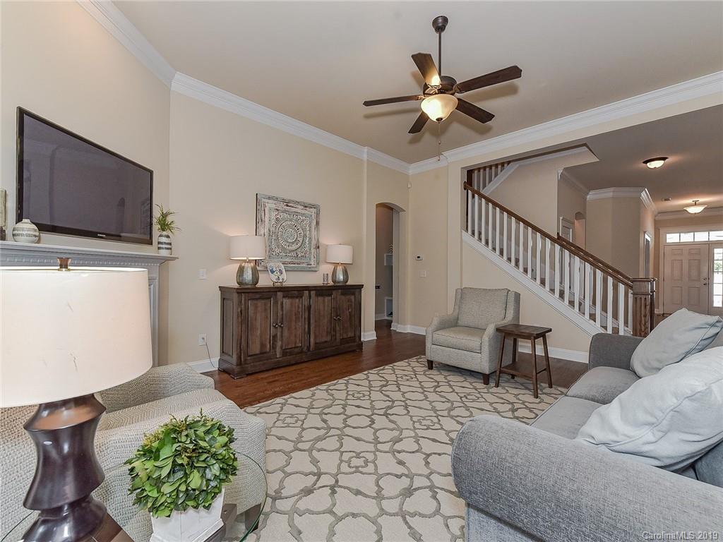 313 Olmstead Street Fort Mill, SC 29708 - Photo 19 of 48 a living room with furniture and a flat screen tv