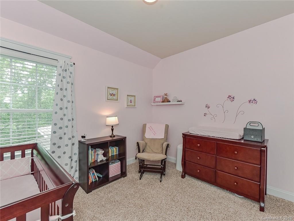 313 Olmstead Street Fort Mill, SC 29708 - Photo 34 of 48 a living room with furniture and a window