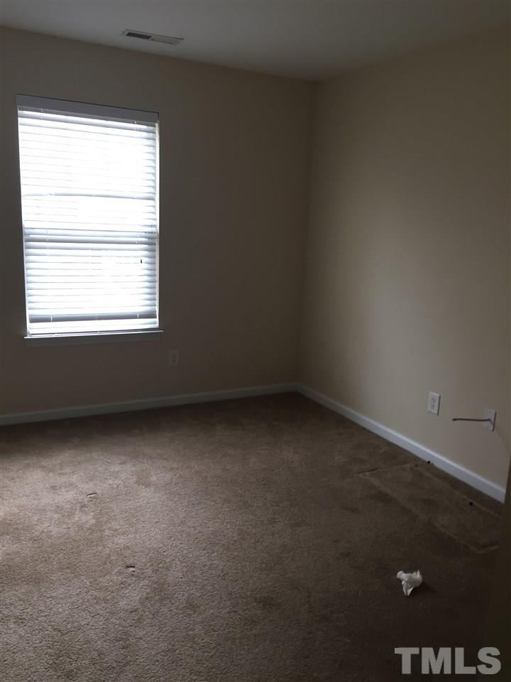 3720 Bison Hill Lane Raleigh, NC 27604 - Photo 9 of 9 an empty room with a window