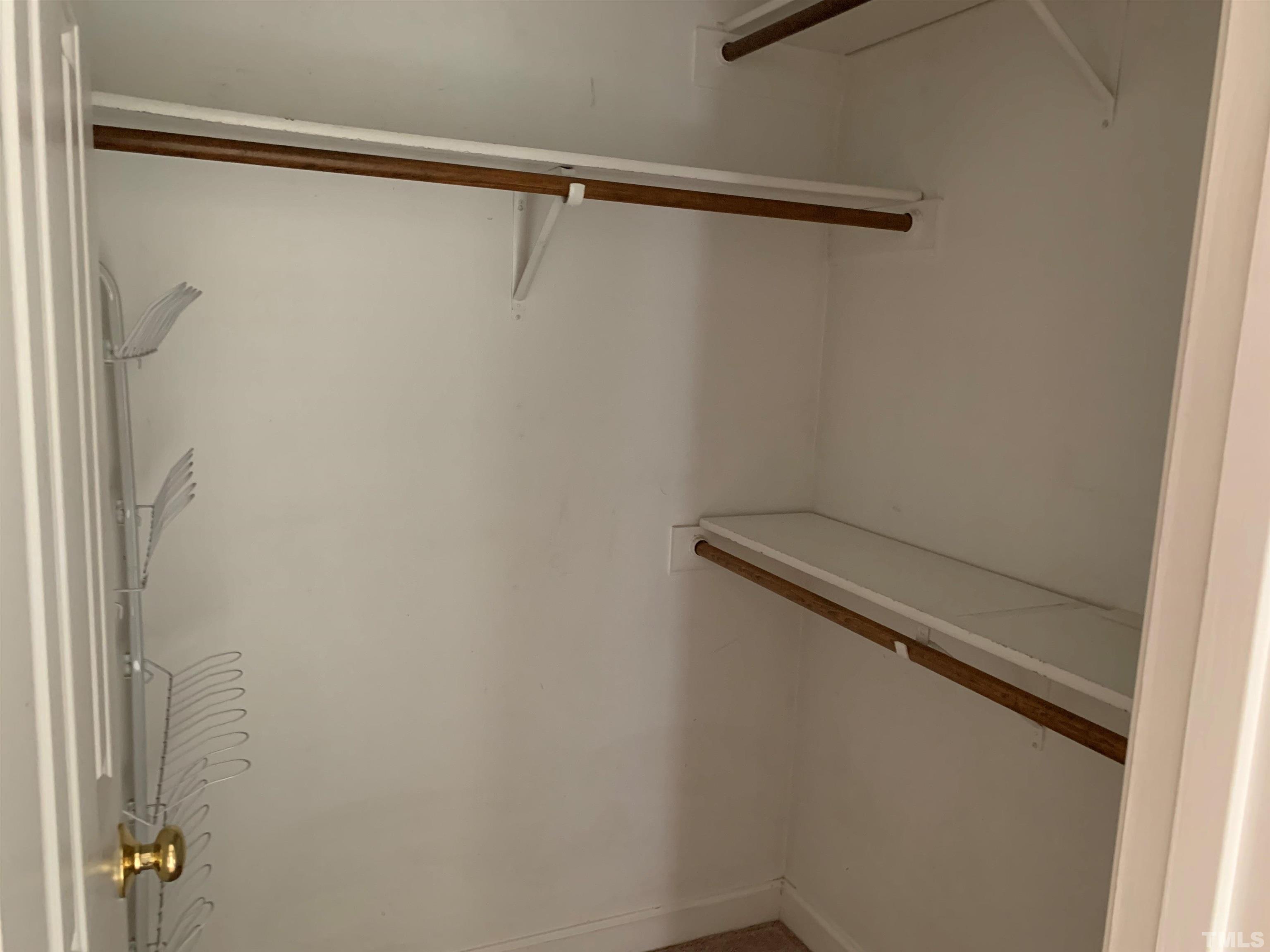 2316 Rolesville Road Wake Forest, NC 27587 - Photo 12 of 17 a view of a room with racks on the wall
