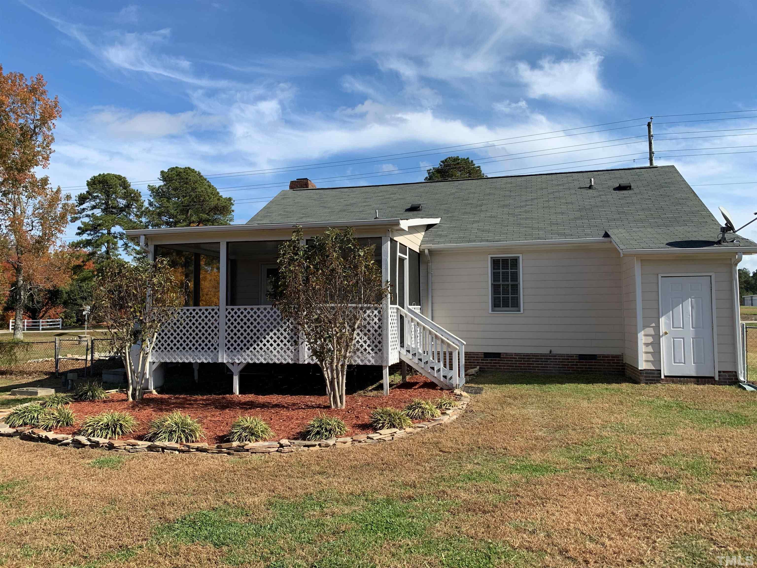 2316 Rolesville Road Wake Forest, NC 27587 - Photo 13 of 17 a front view of a house with a yard
