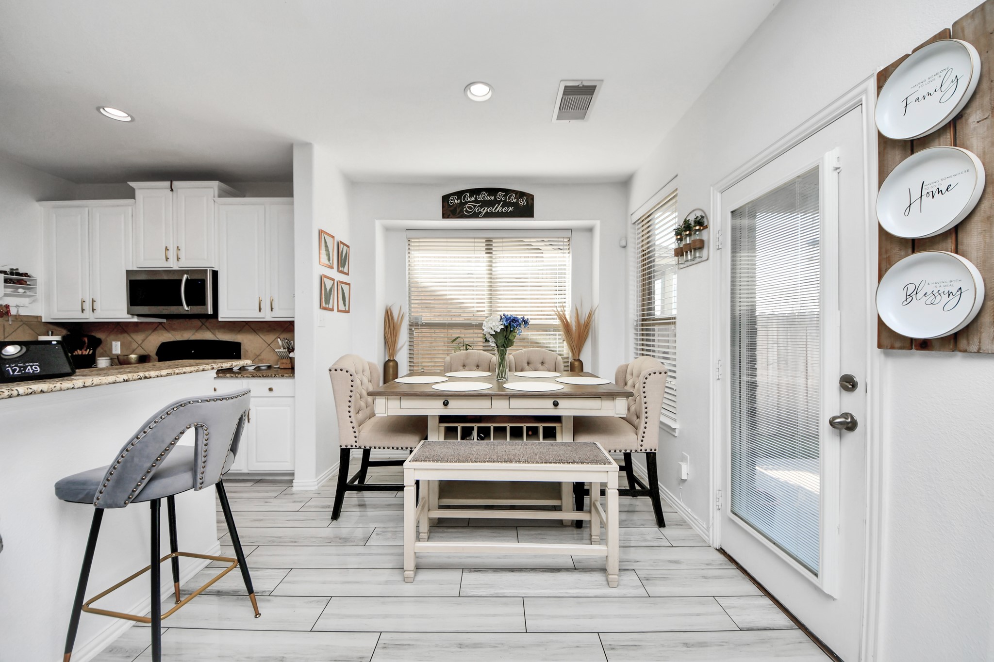 12119 Redbud Brook Trail Houston, TX 77089 - Photo 24 of 48 a kitchen with stainless steel appliances a stove a refrigerator and cabinets