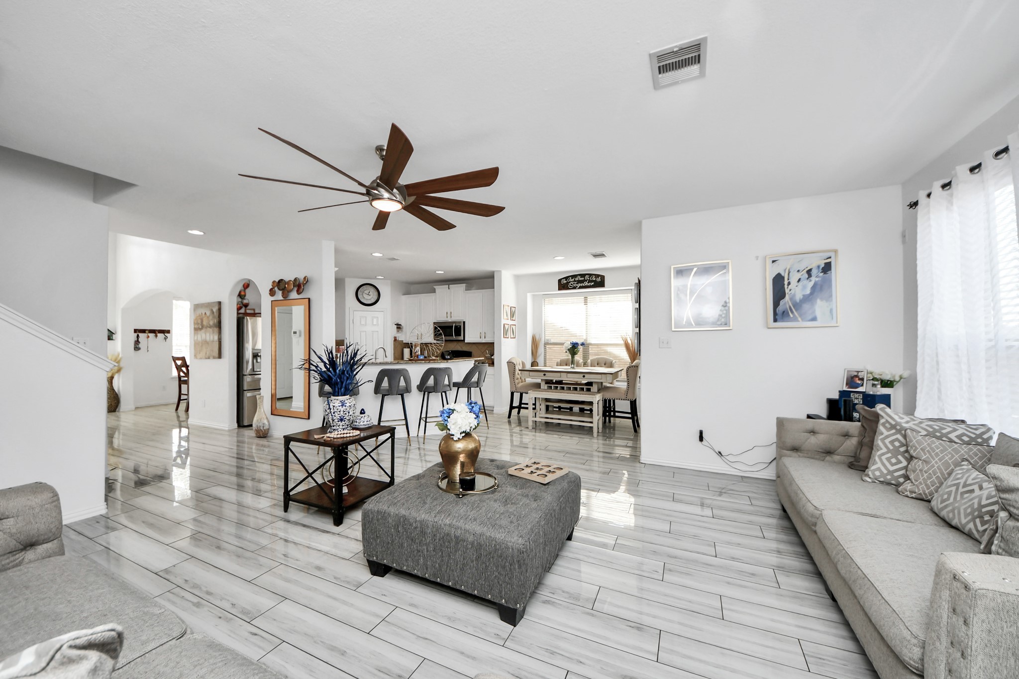 12119 Redbud Brook Trail Houston, TX 77089 - Photo 29 of 48 a living room with furniture kitchen view and a large window