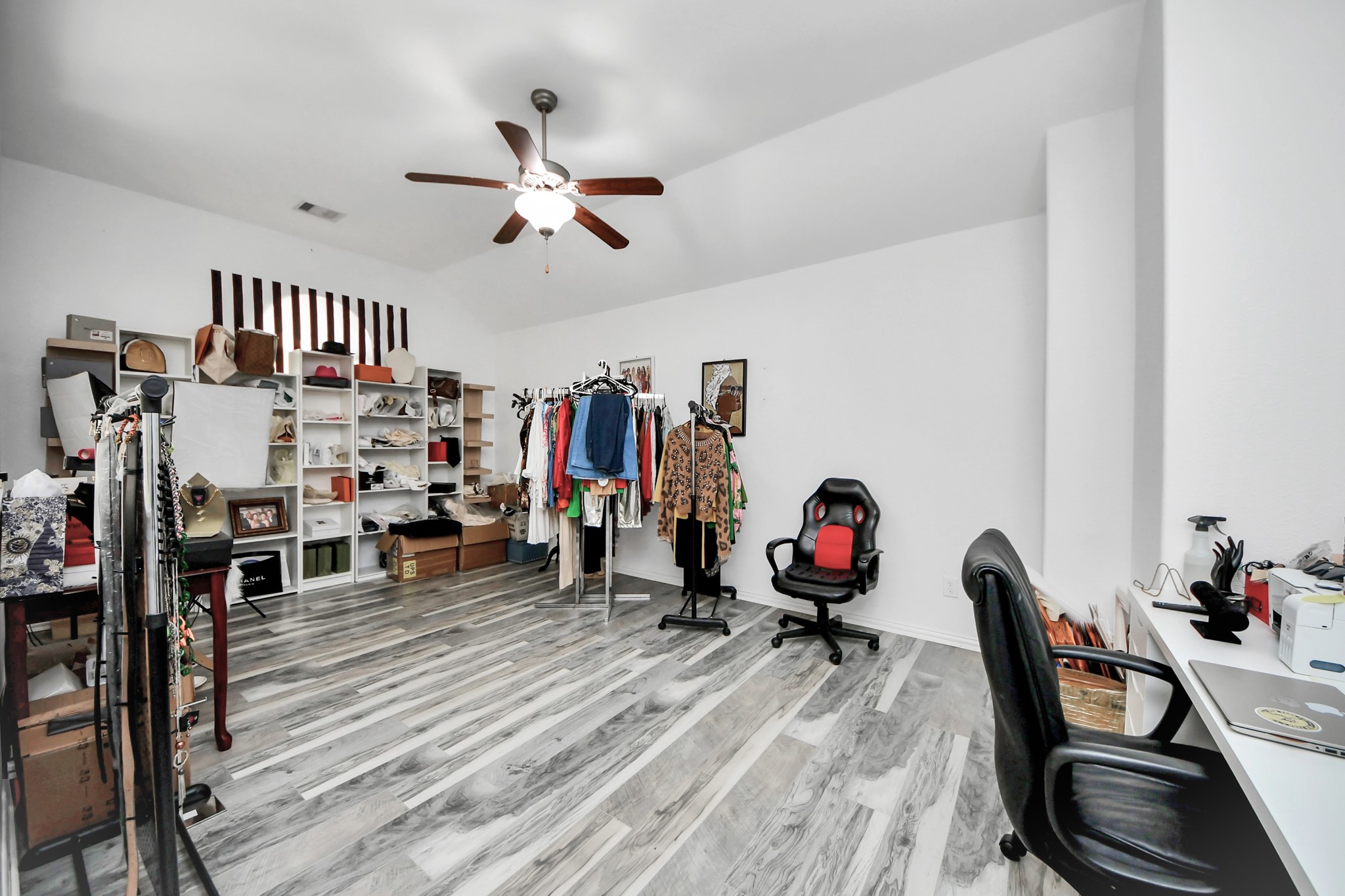 12119 Redbud Brook Trail Houston, TX 77089 - Photo 37 of 48 a living room with lots of gym equipment