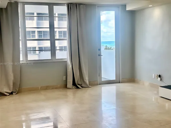 an empty room with windows