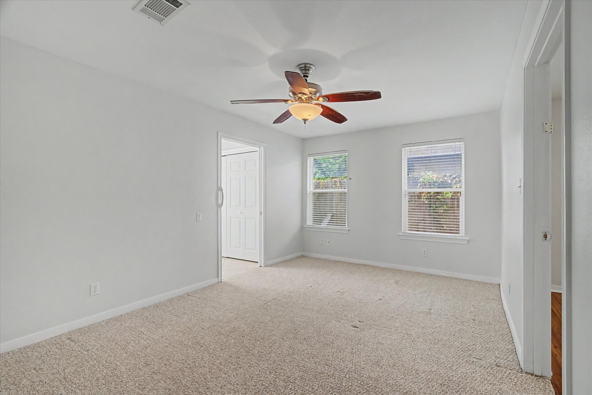 413 Farrer Street Angleton, TX 77515 - Photo 30 of 43 a view of an empty room with a window