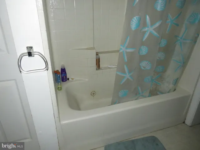 a bathroom with a bathtub