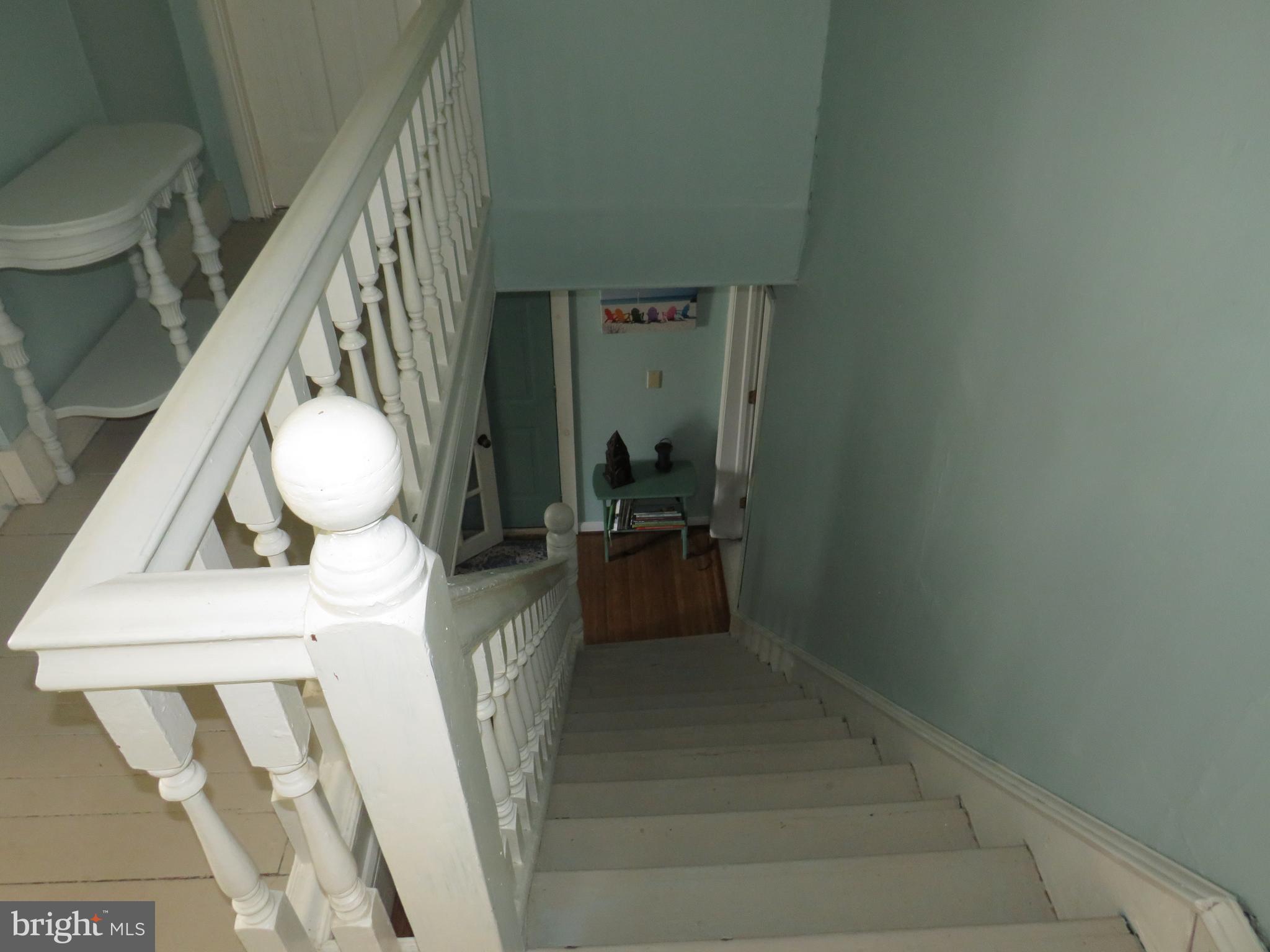 3289 Sackertown Road Crisfield, MD 21817 - Photo 20 of 25 a living room with furniture and a wooden floor