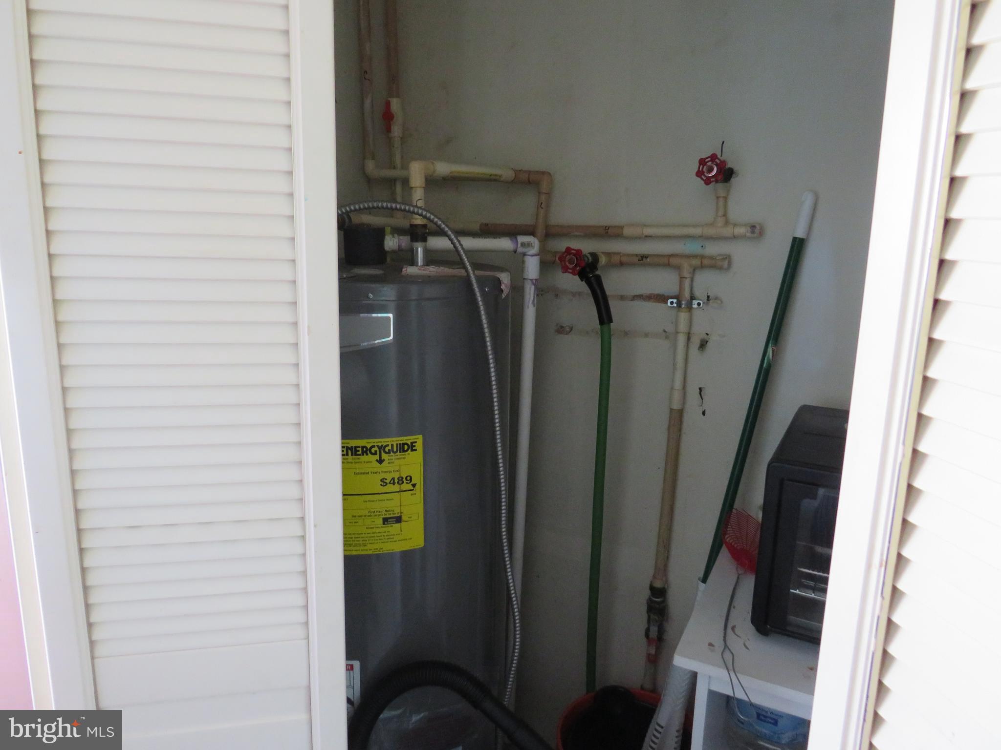 3289 Sackertown Road Crisfield, MD 21817 - Photo 9 of 25 a view of walk in closet with clothes and shoes