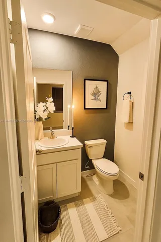 a bathroom with a sink and a toilet