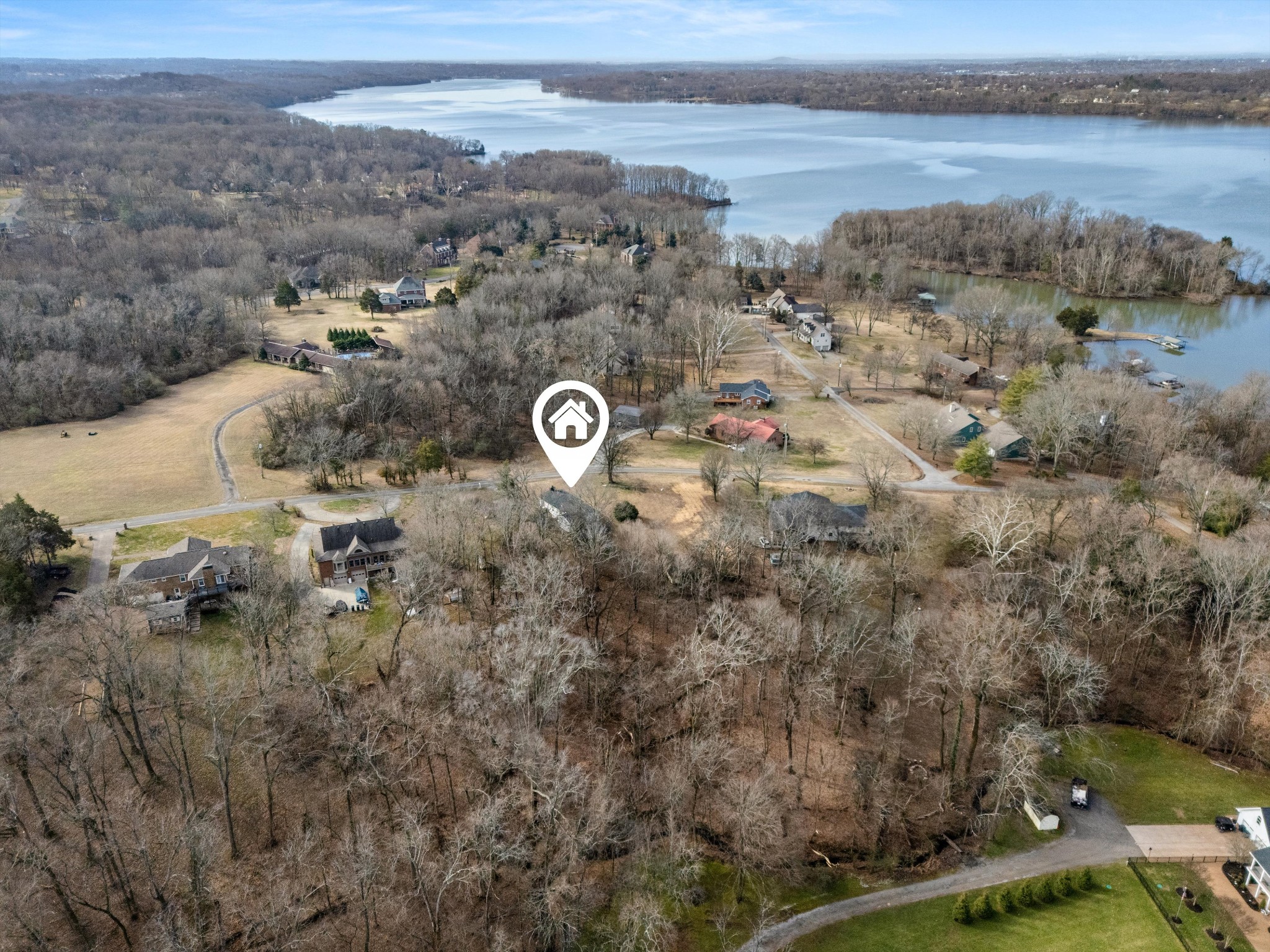 200 Burris Road Mount Juliet, TN 37122 - Photo 27 of 33 a view of a lake with mountains in the background
