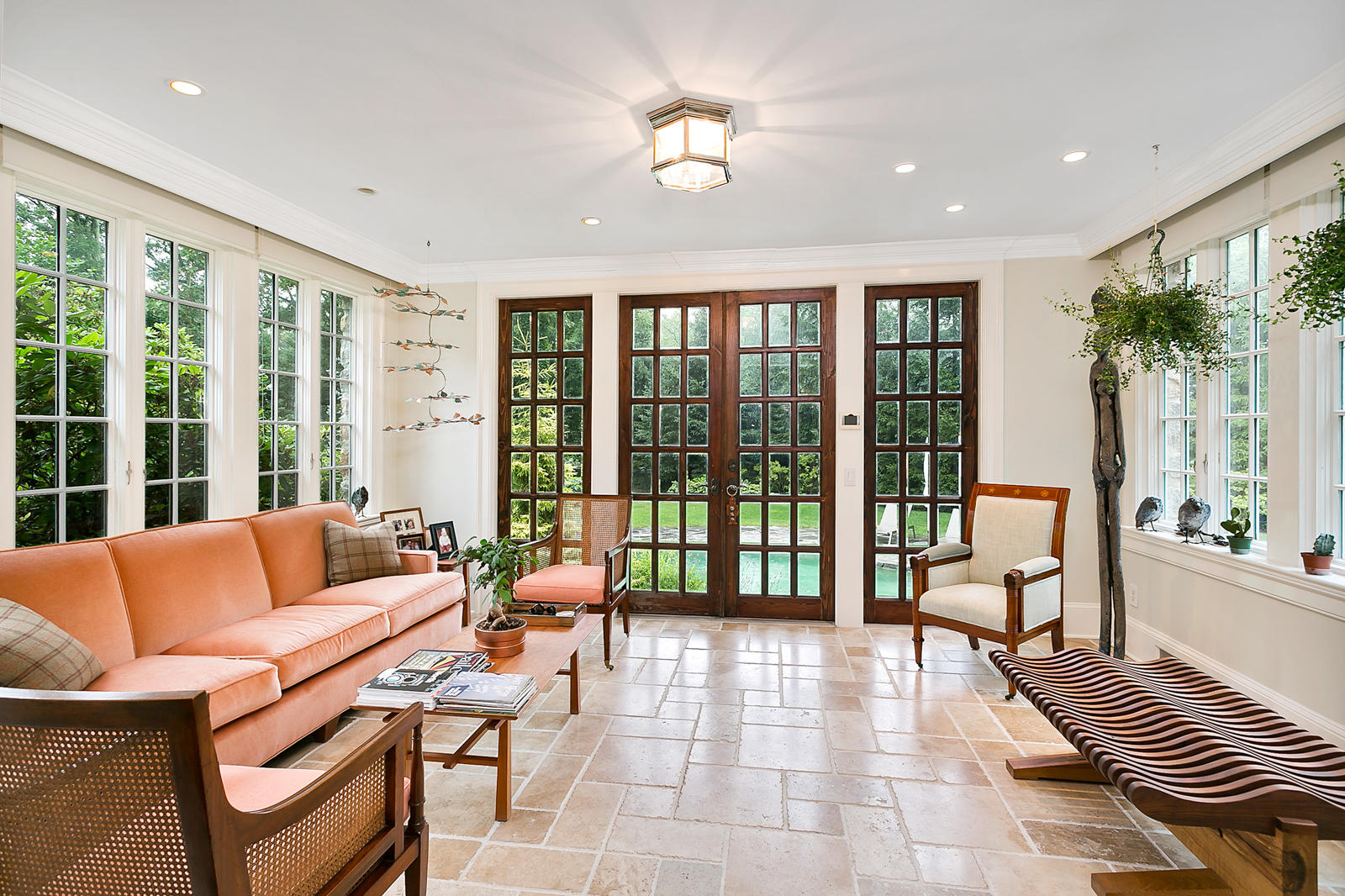 6 Woodley Road Darien, CT 06820 - Photo 13 of 37 a living room with furniture and a large window