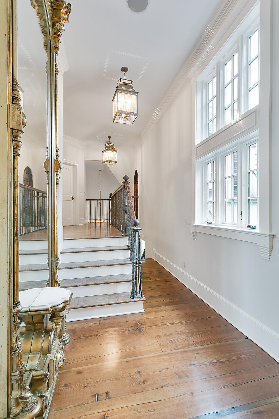 6 Woodley Road Darien, CT 06820 - Photo 16 of 37 a view of entryway and hall with wooden floor