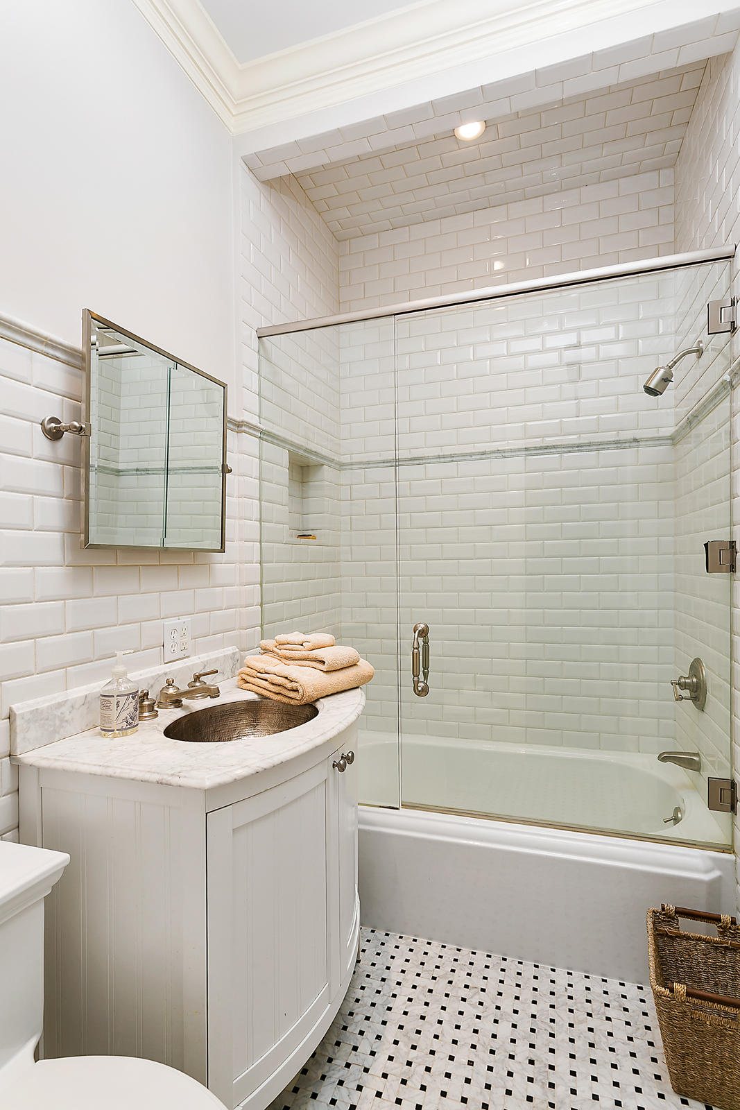 6 Woodley Road Darien, CT 06820 - Photo 24 of 37 a bathroom with a sink a toilet and shower