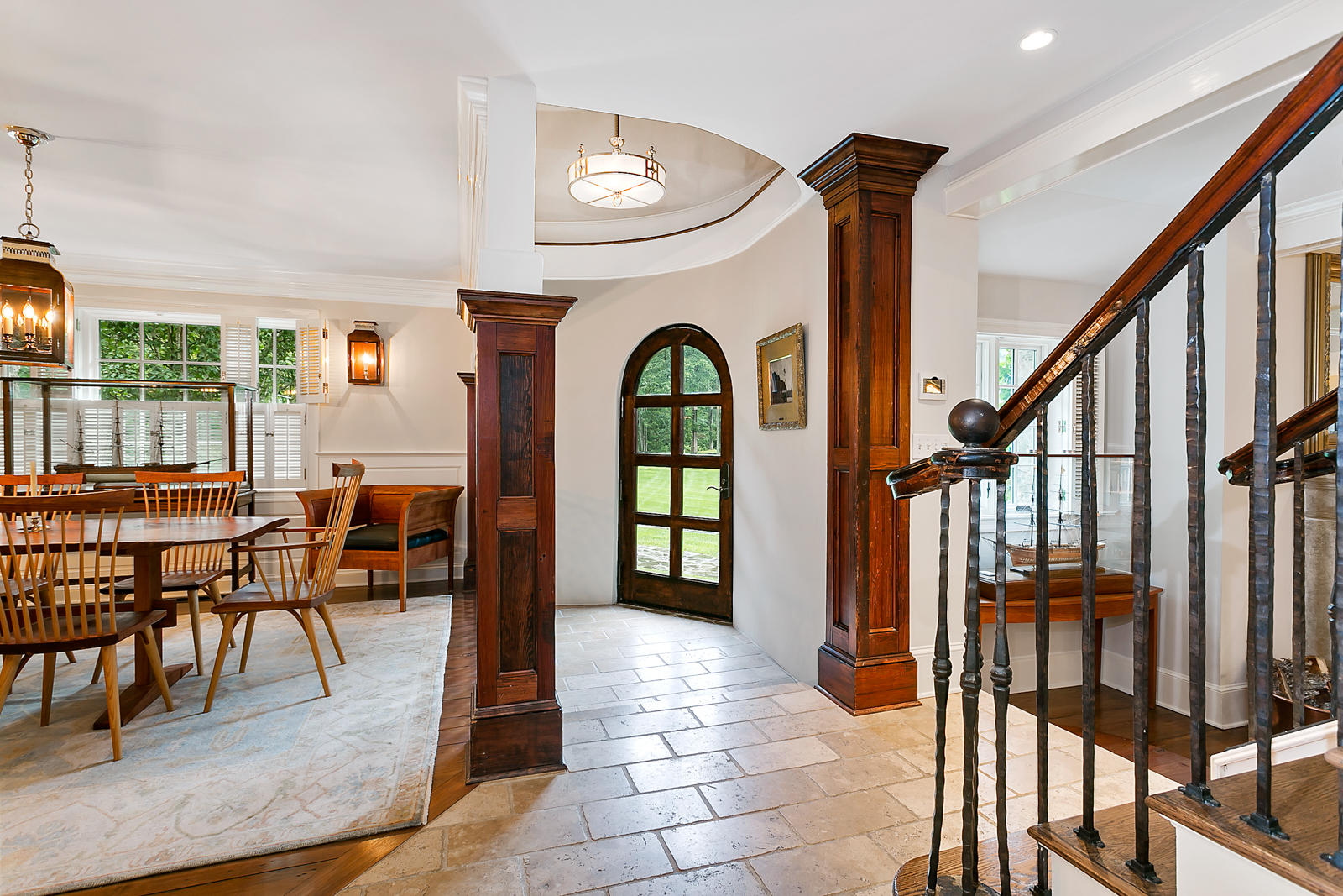 6 Woodley Road Darien, CT 06820 - Photo 27 of 37 a view of staircase with furniture and a large window