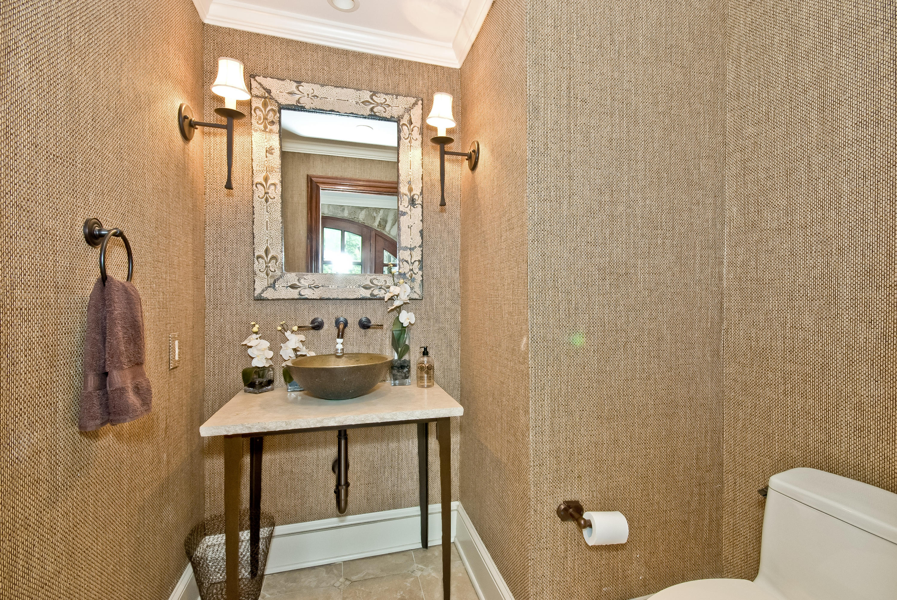 6 Woodley Road Darien, CT 06820 - Photo 30 of 37 a bathroom with a toilet a sink and mirror
