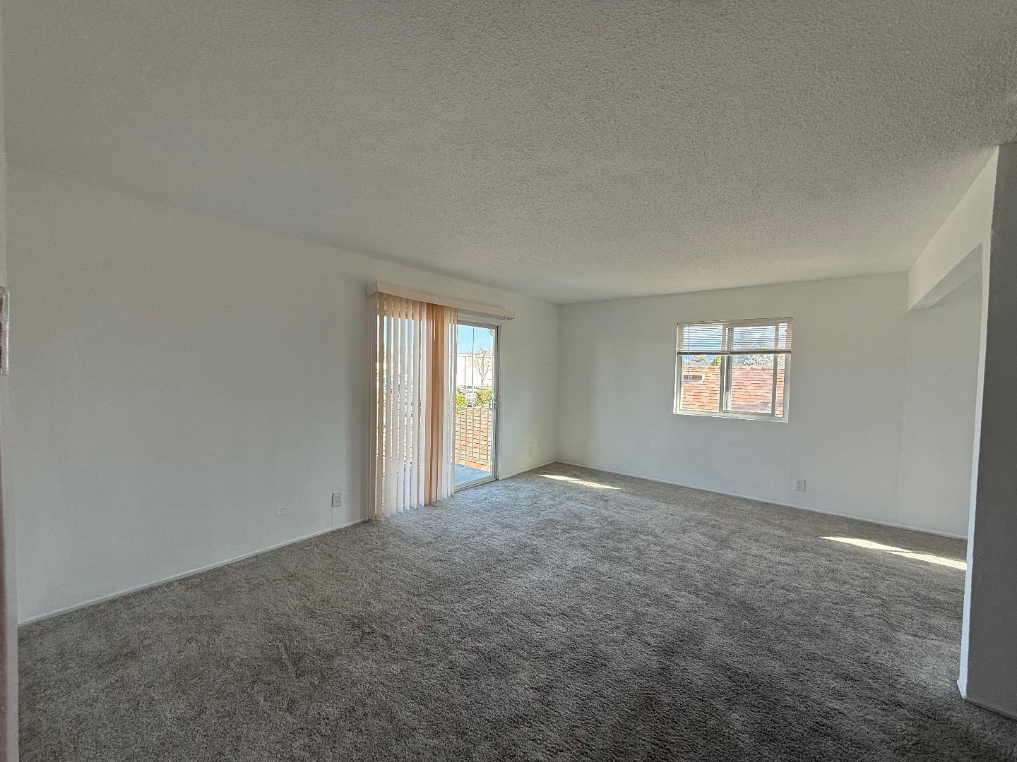 117 Adler Avenue Campbell, CA 95008 - Photo 3 of 7 a view of an empty room with a window