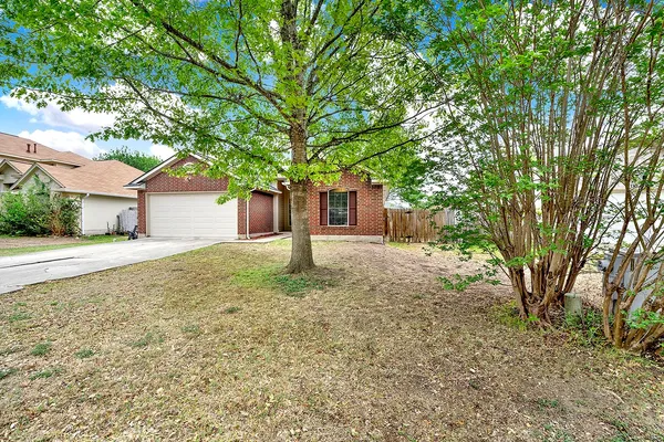 a house with trees in front of it