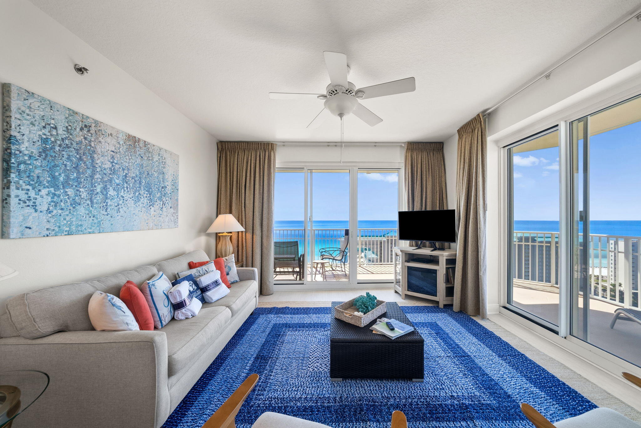 112 Seascape Drive, Unit 1910 Miramar Beach, FL 32550 - Photo 11 of 49 a living room with furniture fireplace and a large window
