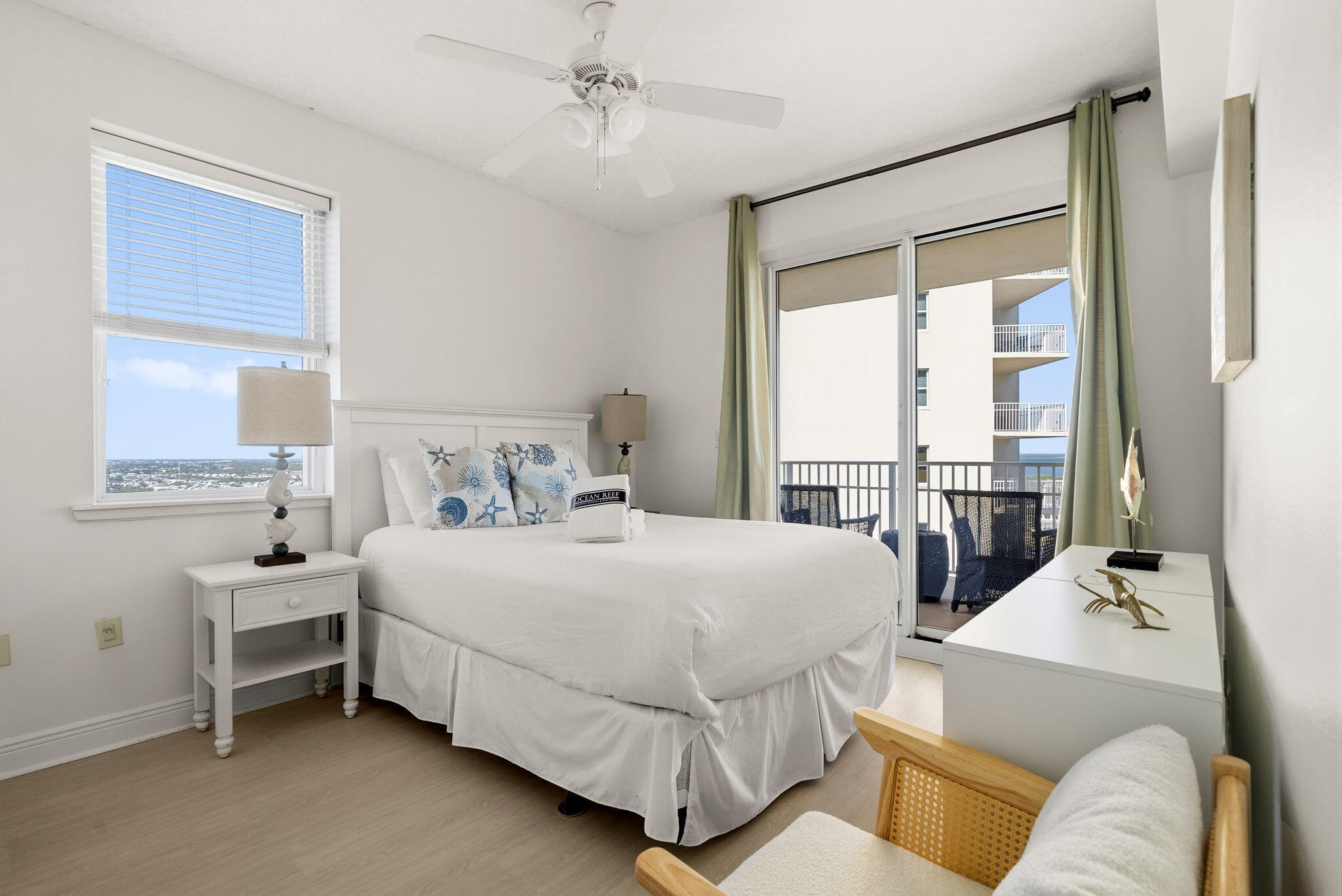 112 Seascape Drive, Unit 1910 Miramar Beach, FL 32550 - Photo 14 of 49 a bedroom with a bed couch and a window