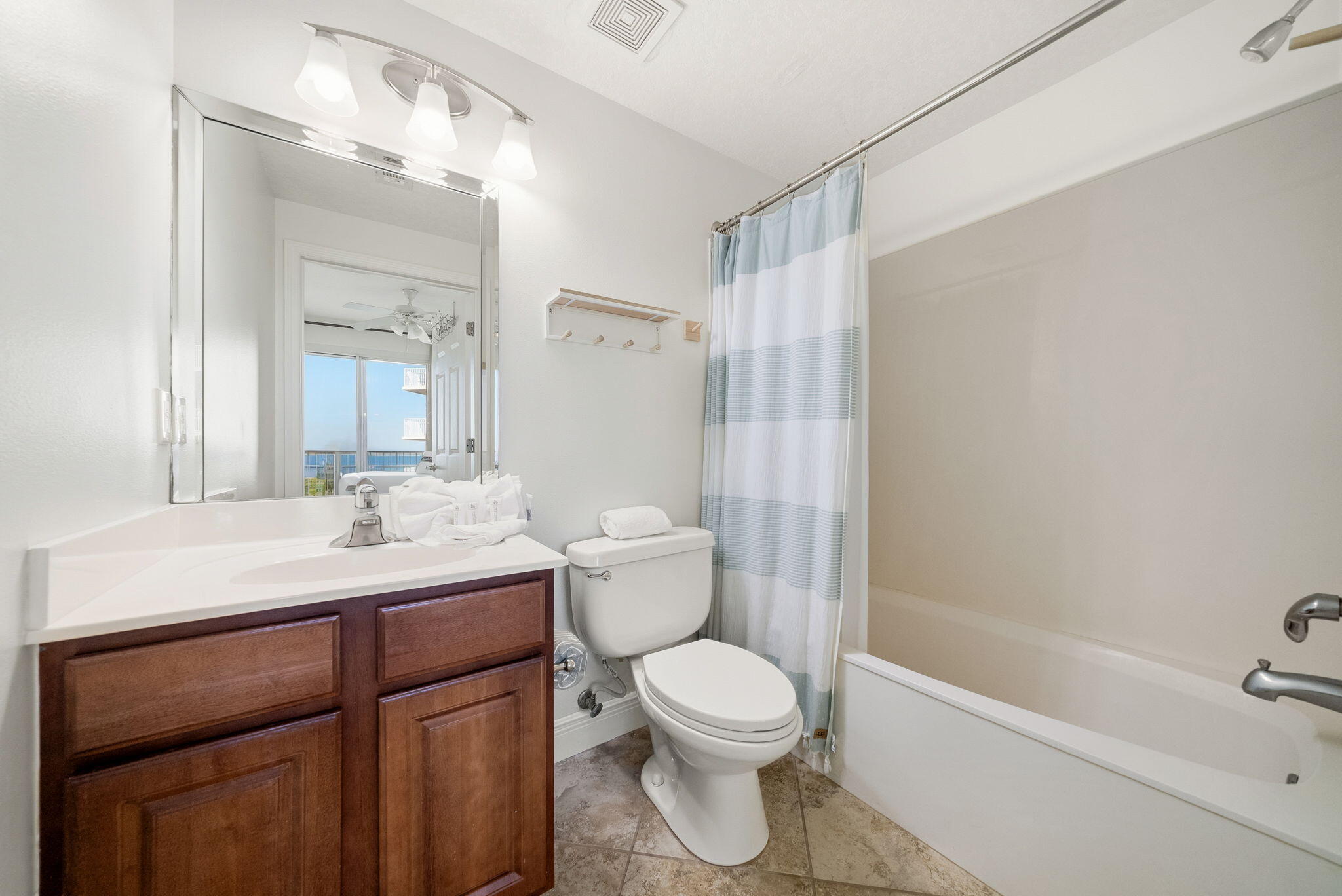 112 Seascape Drive, Unit 1910 Miramar Beach, FL 32550 - Photo 16 of 49 a bathroom with a sink a toilet and shower