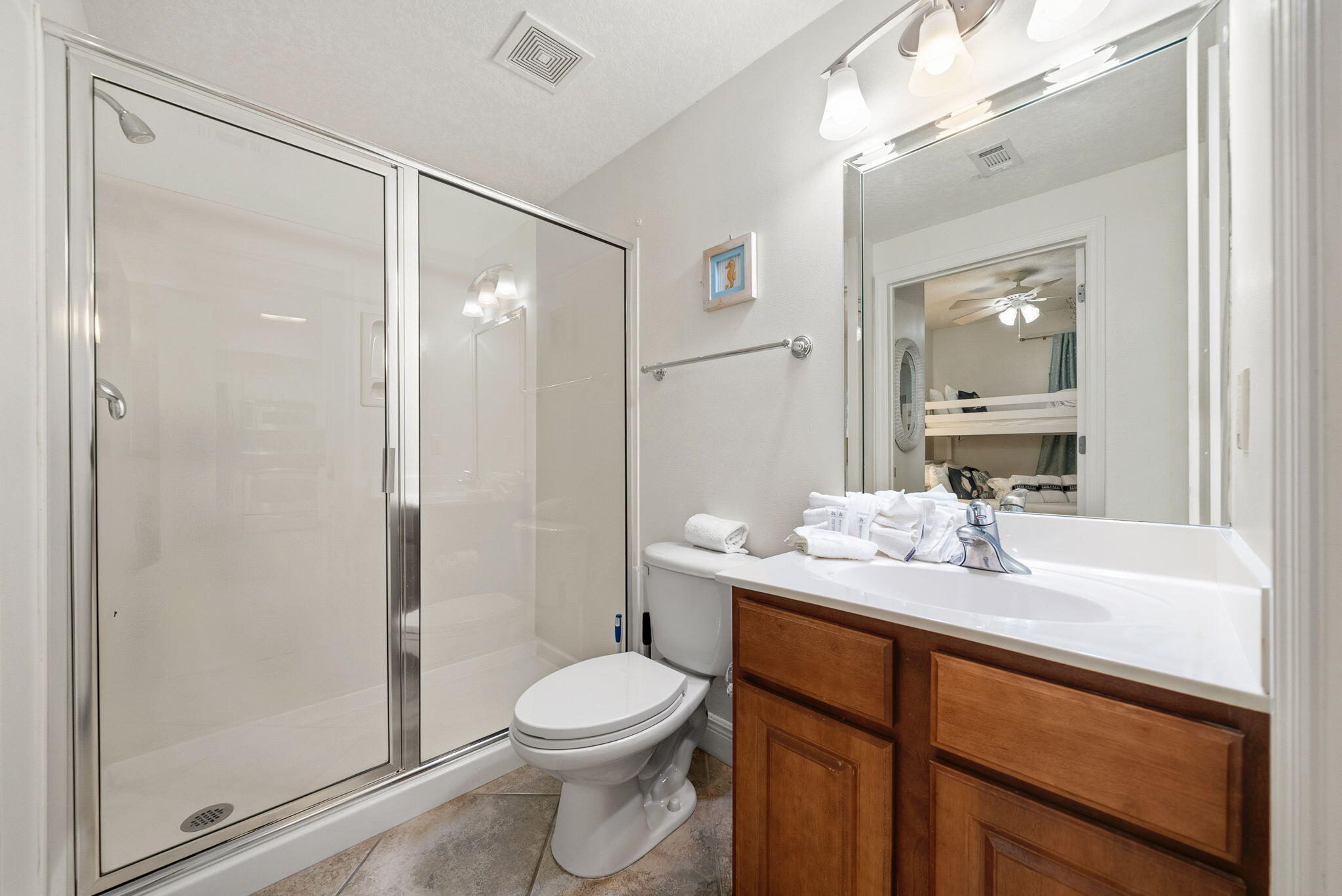 112 Seascape Drive, Unit 1910 Miramar Beach, FL 32550 - Photo 19 of 49 a bathroom with a sink a toilet and shower