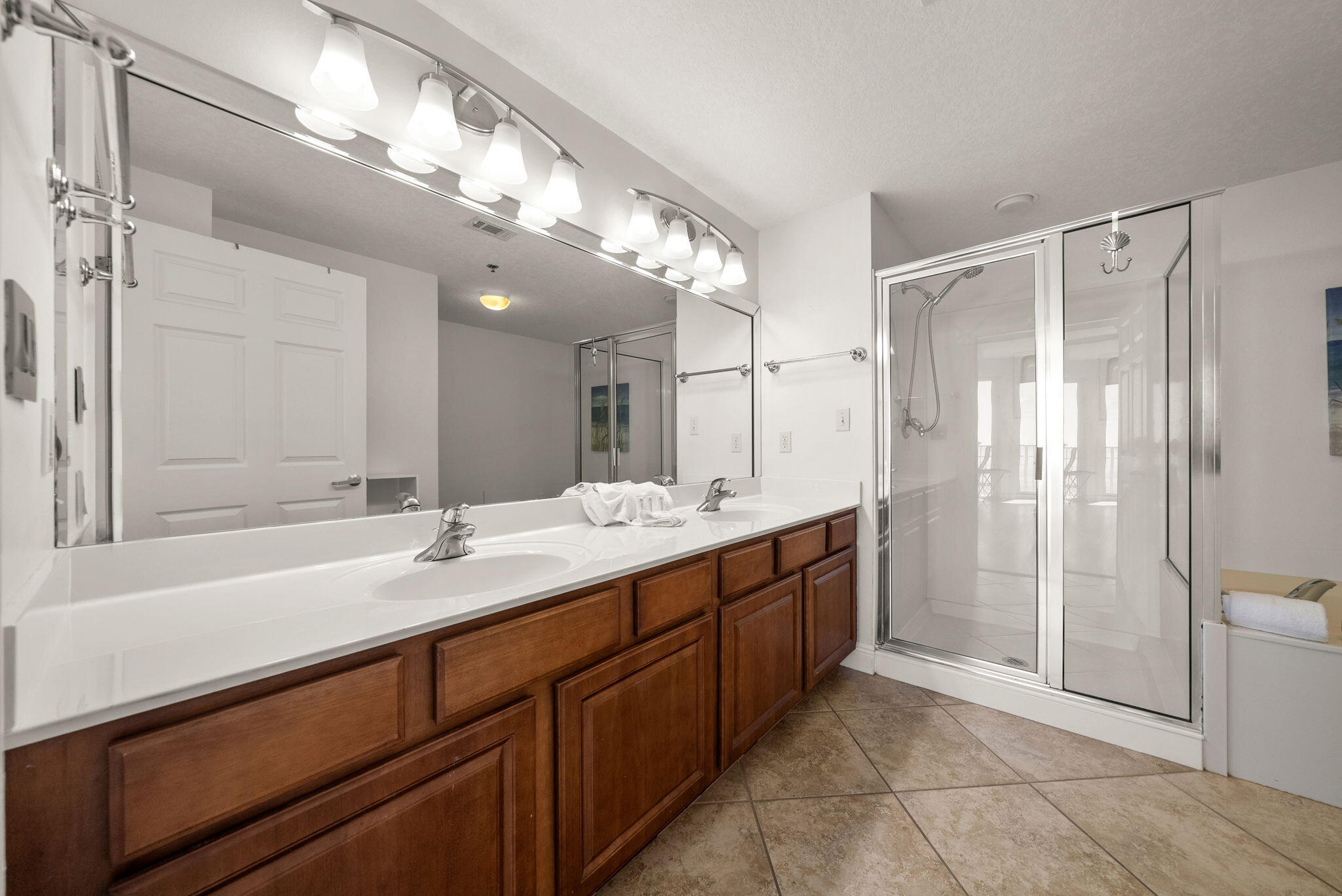 112 Seascape Drive, Unit 1910 Miramar Beach, FL 32550 - Photo 23 of 49 a bathroom with a granite countertop sink mirror and double