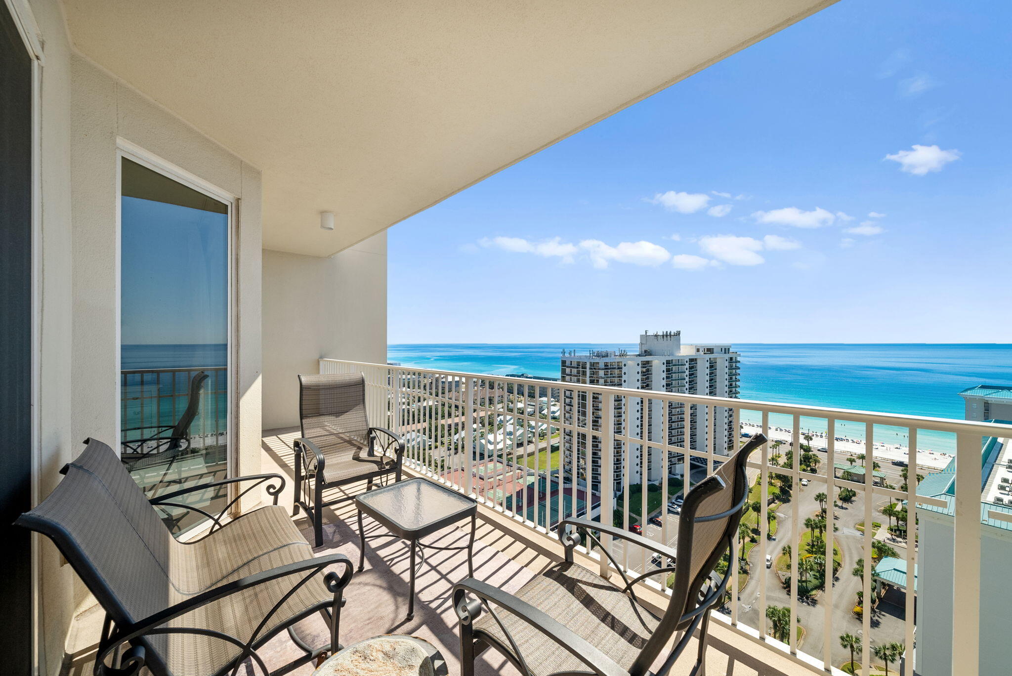 112 Seascape Drive, Unit 1910 Miramar Beach, FL 32550 - Photo 32 of 49 a view of balcony with chairs and potted plants