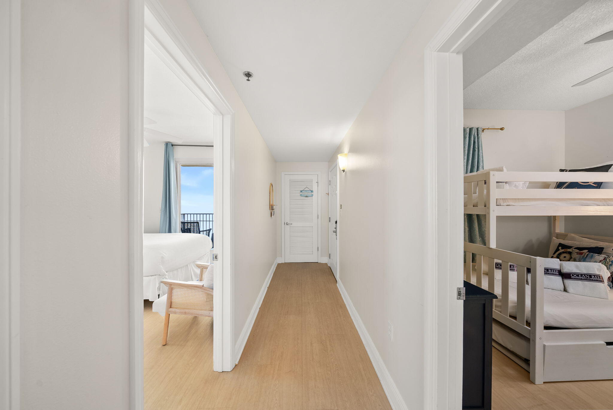 112 Seascape Drive, Unit 1910 Miramar Beach, FL 32550 - Photo 4 of 49 a view of a hallway with workspace and a living room
