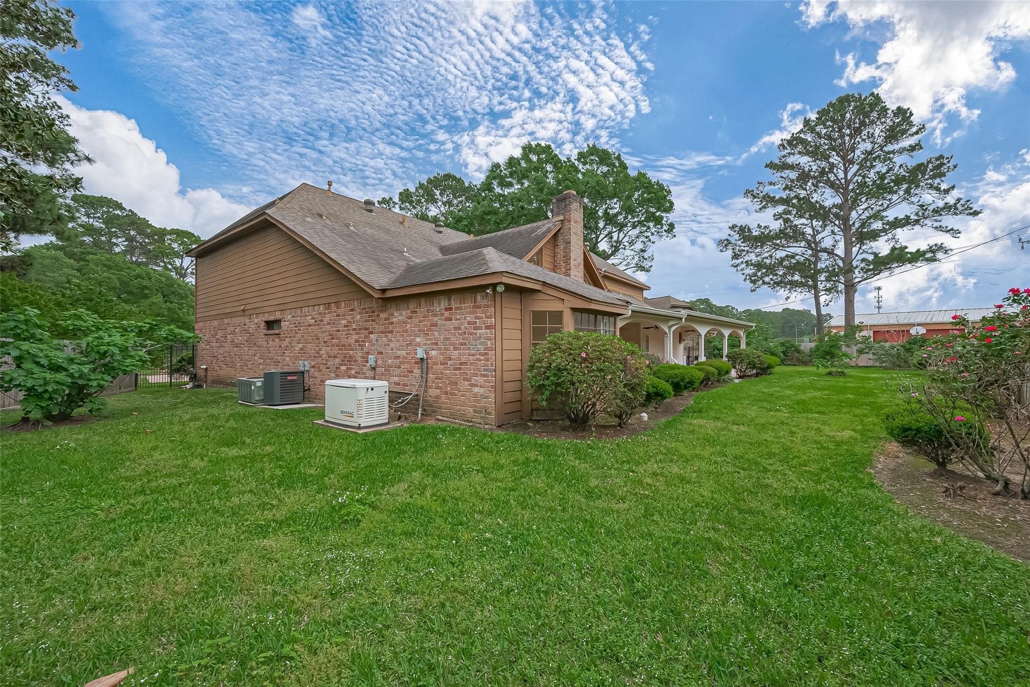 8019 Beaufort Drive Spring, TX 77379 - Photo 41 of 47 a front view of a house with a yard and tree