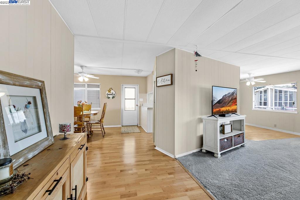 840 Sungold Circle Livermore, CA 94551 - Photo 11 of 28 a living room with furniture and a flat screen tv