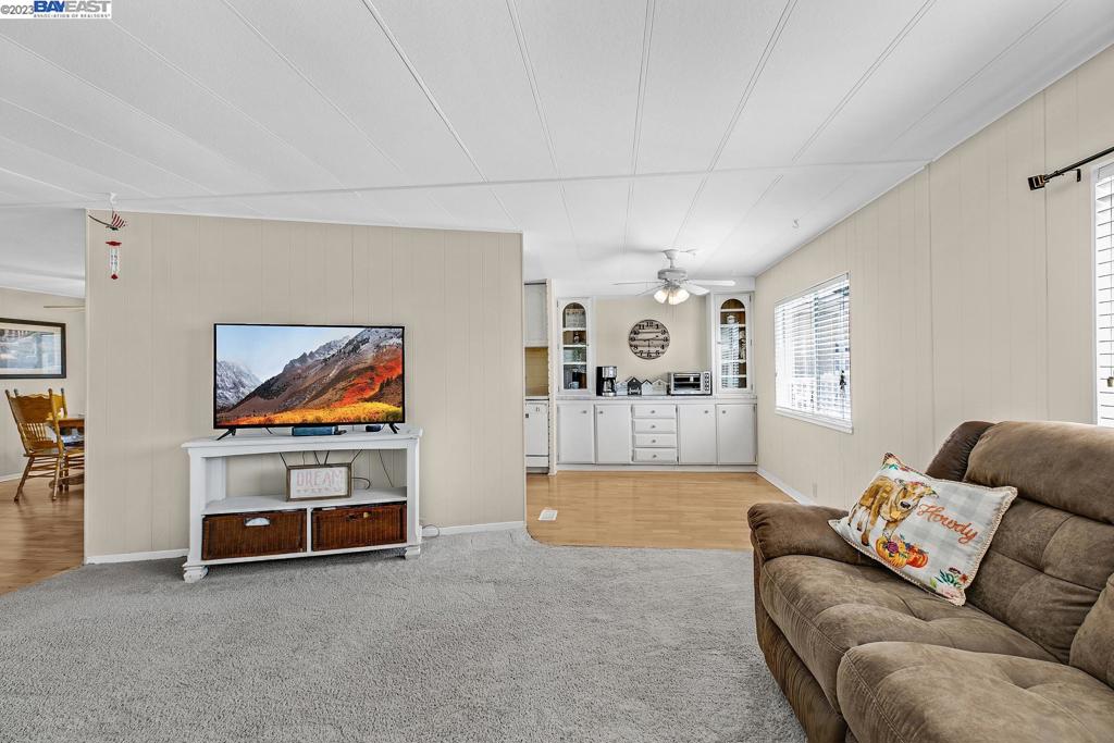 840 Sungold Circle Livermore, CA 94551 - Photo 13 of 28 a living room with furniture and a flat screen tv