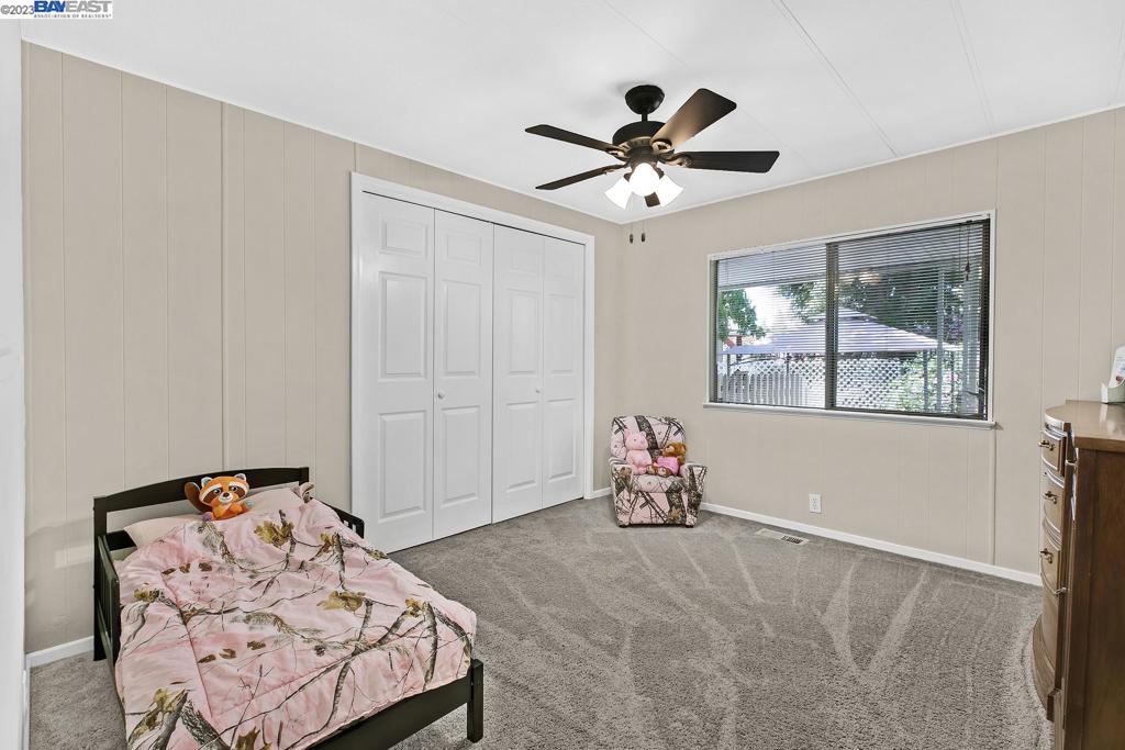840 Sungold Circle Livermore, CA 94551 - Photo 19 of 28 a bedroom with a bed and a window