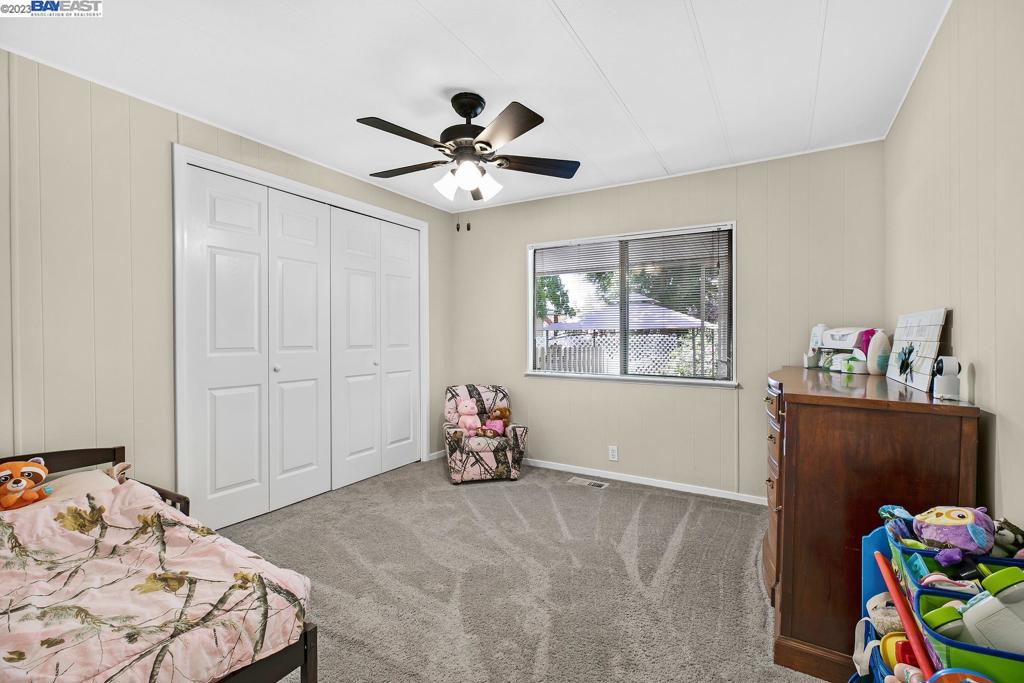 840 Sungold Circle Livermore, CA 94551 - Photo 20 of 28 a bedroom with a bed and a window