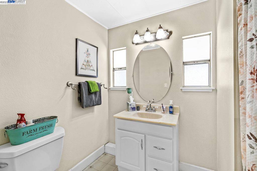 840 Sungold Circle Livermore, CA 94551 - Photo 21 of 28 a bathroom with a sink mirror and vanity