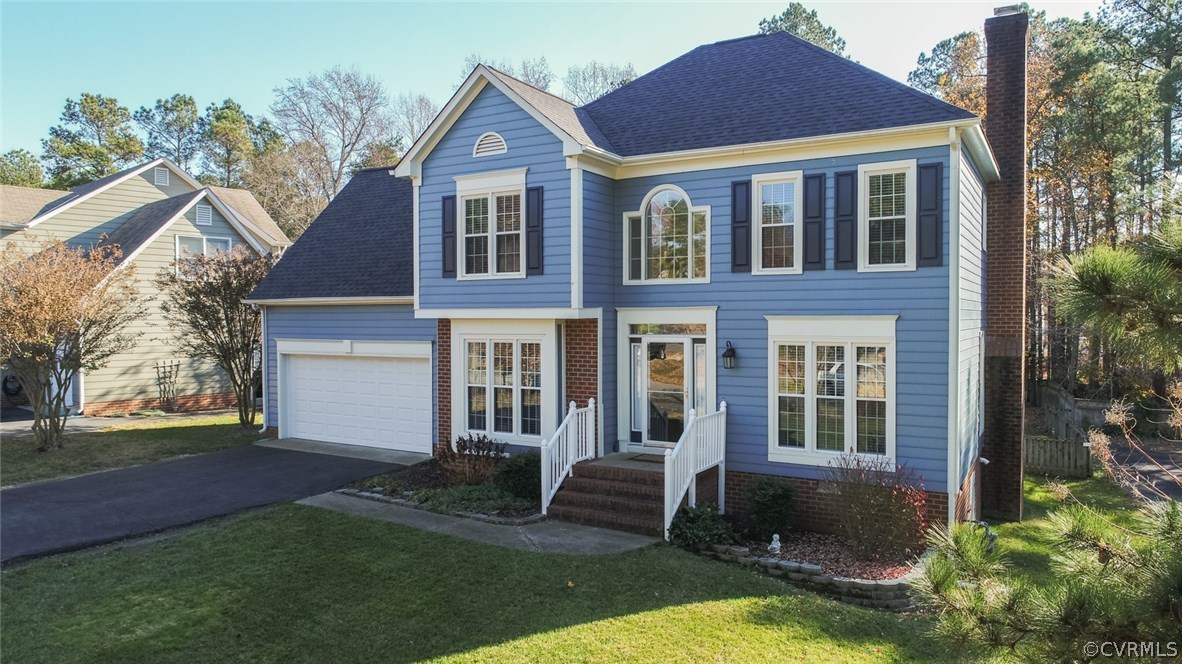 11907 Taplow Road Midlothian, VA 23112 - Photo 2 of 29 a view of house with a yard