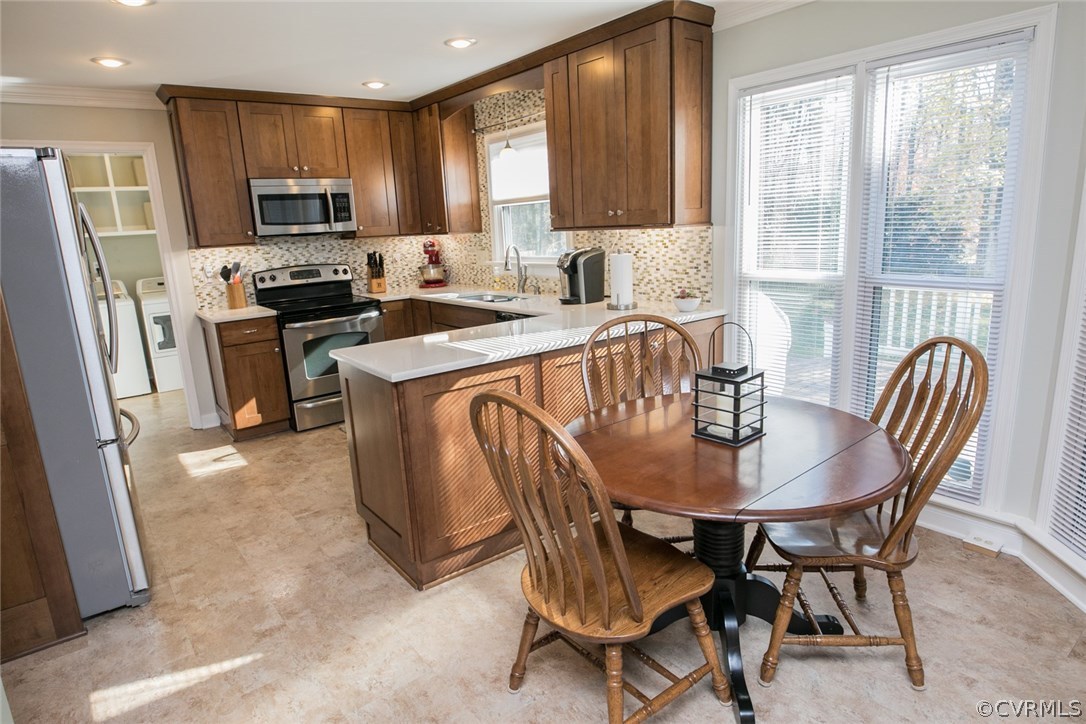 11907 Taplow Road Midlothian, VA 23112 - Photo 10 of 29 a dining room with furniture and window