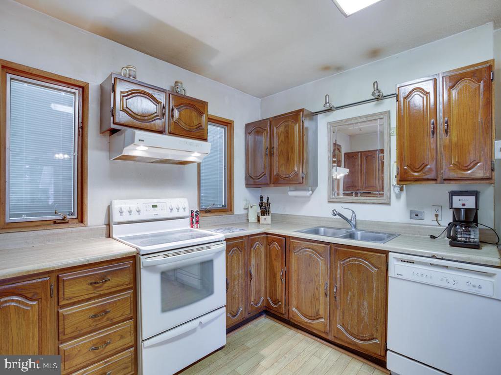 5482 Hallowing Point Road Prince Frederick, MD 20678 - Photo 8 of 39 a kitchen with a stove oven and sink