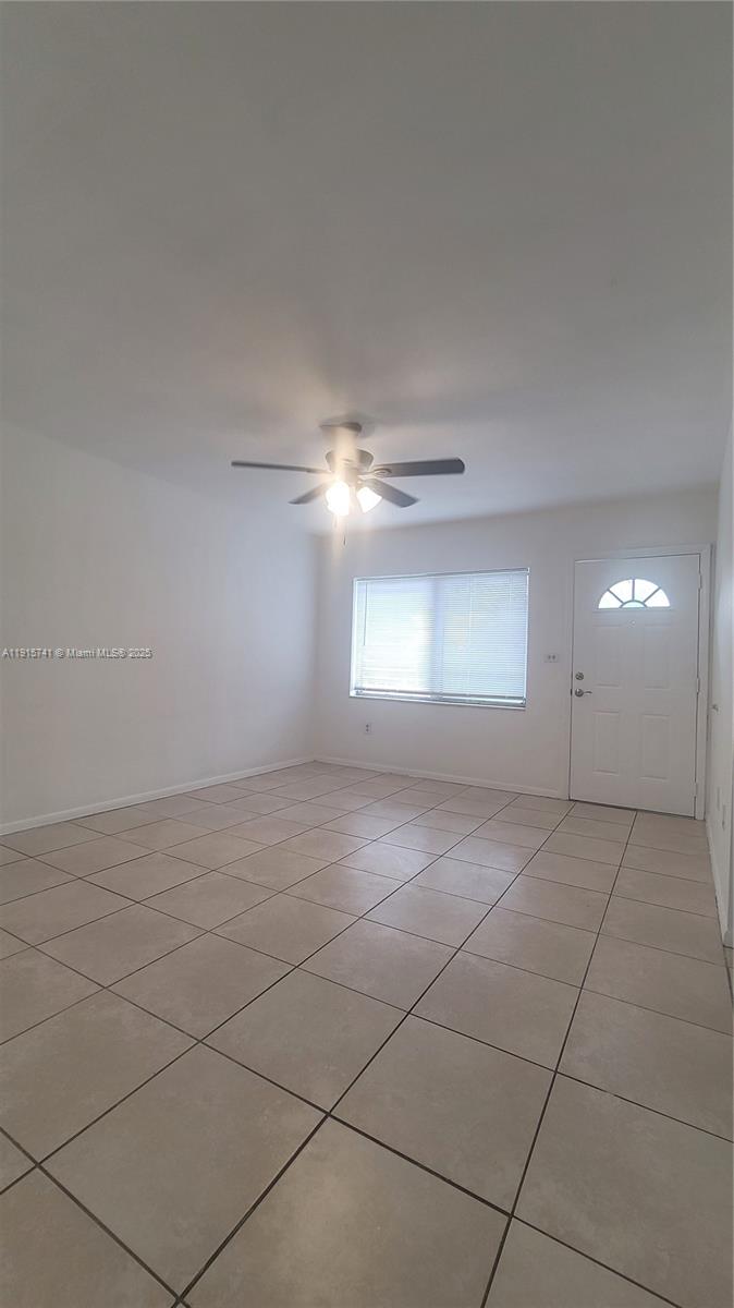 2615 Southwest 22nd Avenue, Unit 5 Miami, FL 33133 - Photo 7 of 10 a view of an empty room with windows
