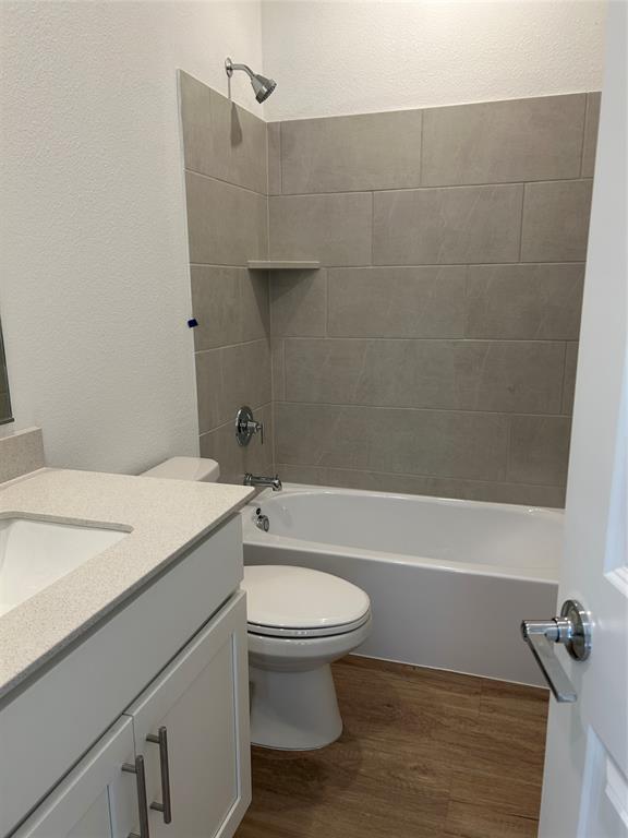 148 Breeds Hl Road Little Elm, TX 75068 - Photo 9 of 20 a bathroom with a sink a toilet and shower