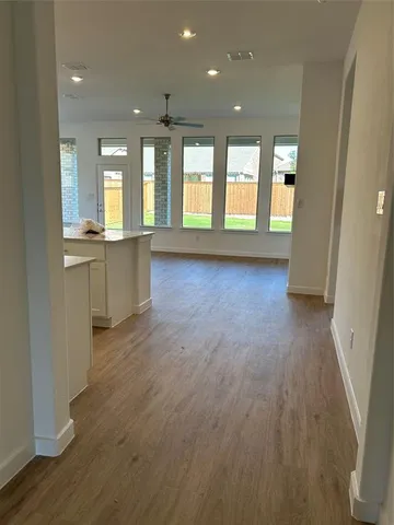 a view of an empty room and window