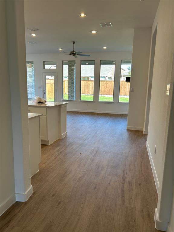 148 Breeds Hl Road Little Elm, TX 75068 - Photo 2 of 20 a view of an empty room and window