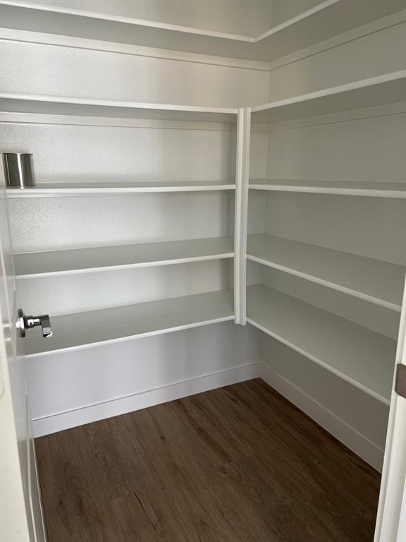 148 Breeds Hl Road Little Elm, TX 75068 - Photo 6 of 20 a view of a room with rack on the wall