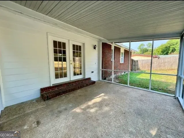 a view of outdoor space with sliding door