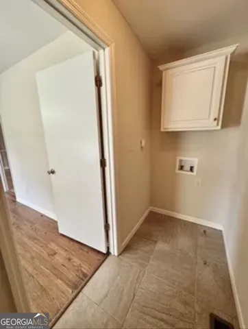 a bathroom with a sink a toilet and bathtub
